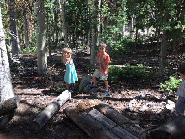 Felicity and Beckett in the woods.