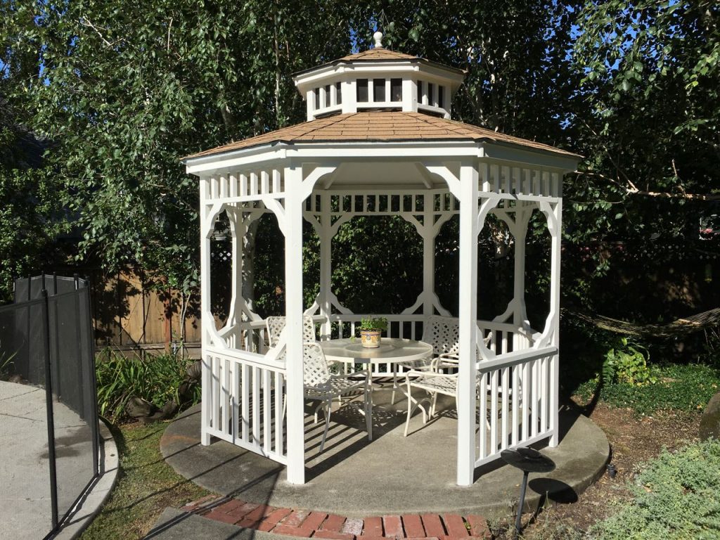 Gazebo painted white.