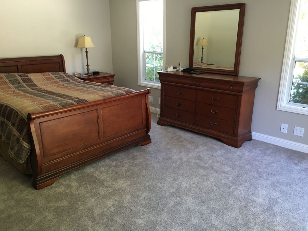 Master bedroom with new paint and carpet.