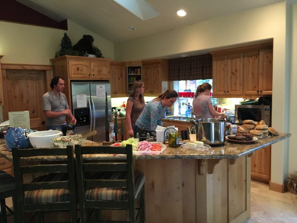 Sam, Chrissy, Cynthia and Michelle cook dinner.