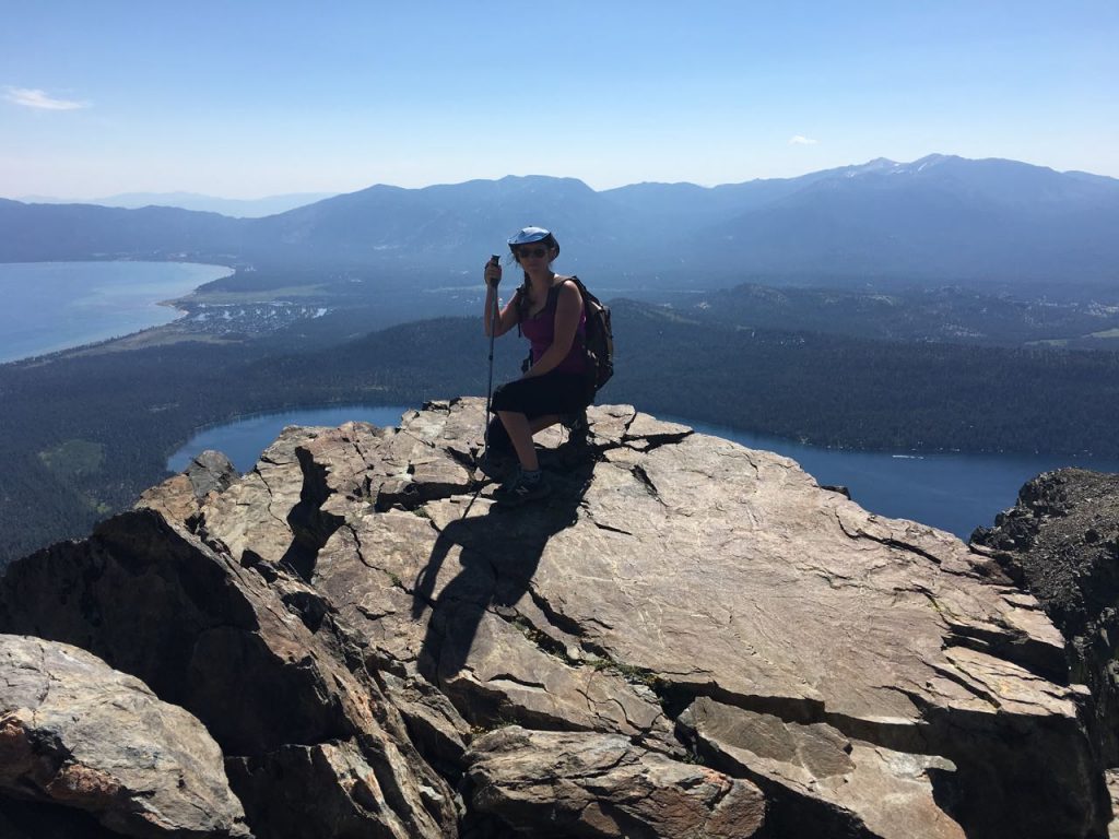Chrissy overlooking view of Fallen Leaf Lake and Lake Tahoe in distance.