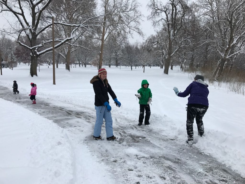 Throwing snowballs.