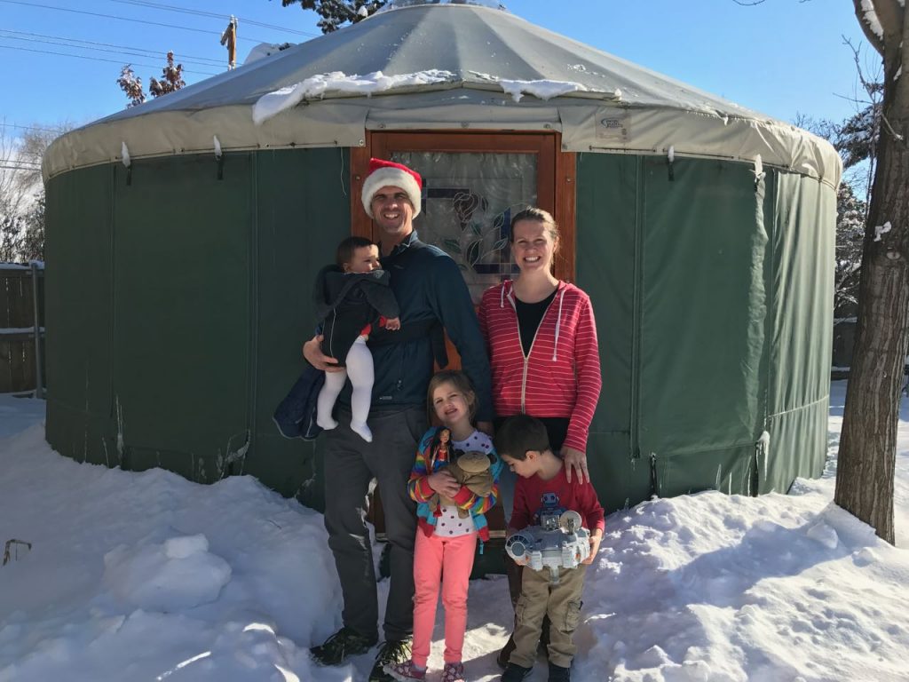 The Sidwell outside Chrissy's yurt that was their home for three days.