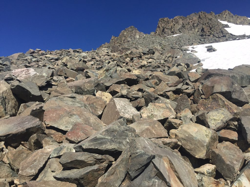 Hike straight up on boulders to regain the trail