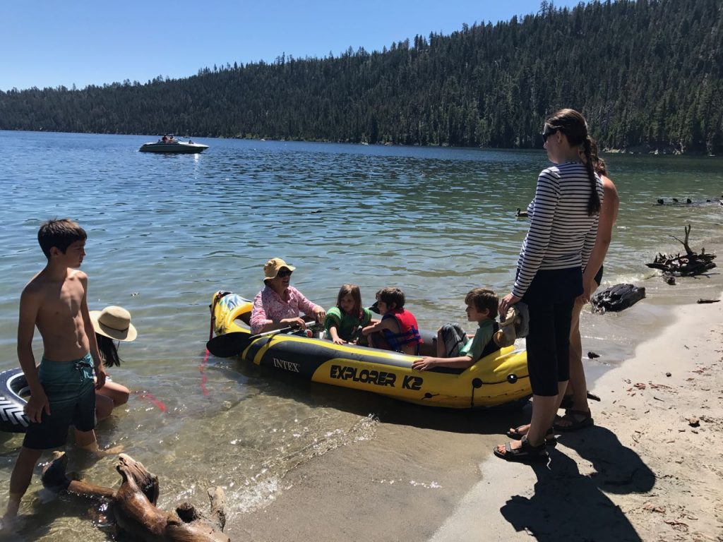 Linda, Felicity, Beckett, Holland and Cynthia get ready to kayak to Fannette Island.